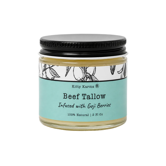 2 oz glass jar of Kitty Karma Studio Goji Glow Tallow Balm on a neutral background.